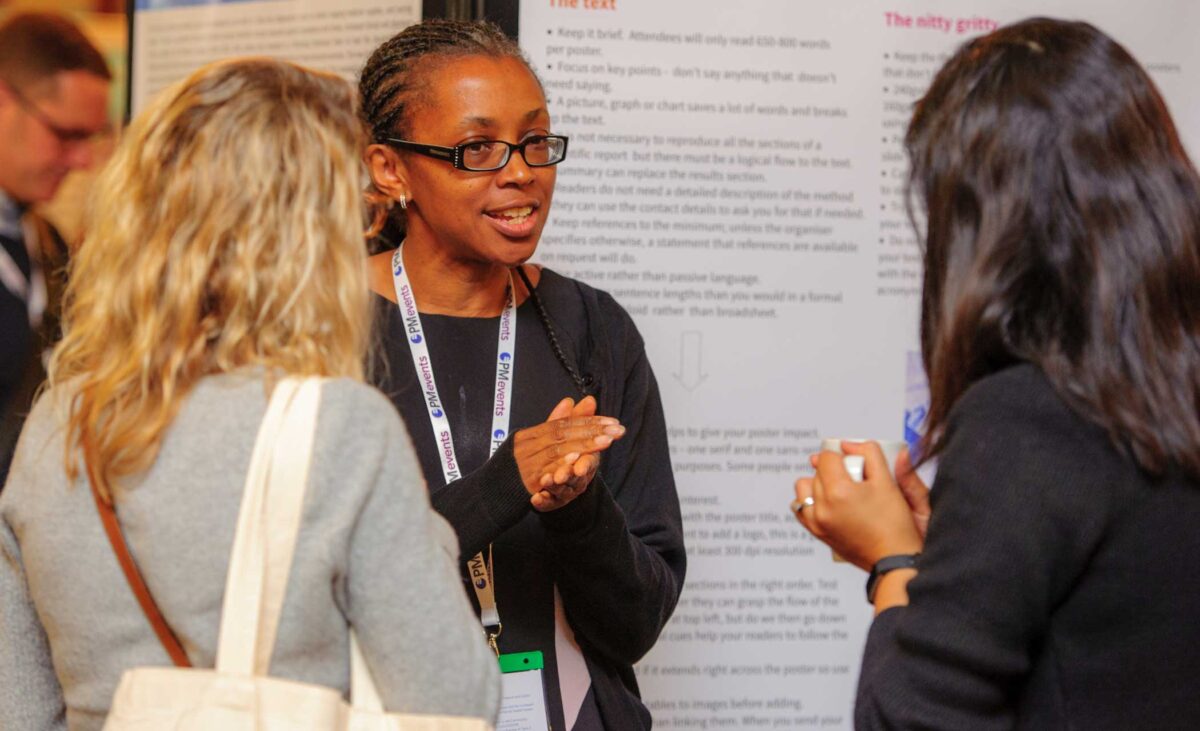 Pharmacist presenting a poster at a UKCPA event