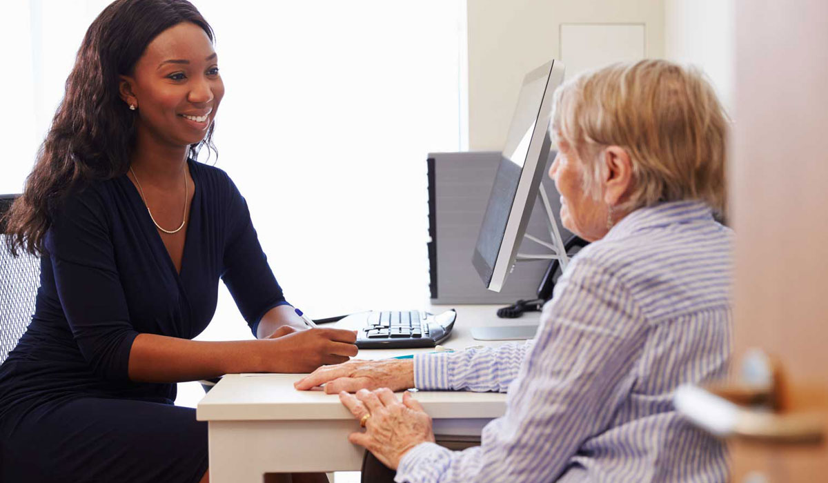 Pharmacist consulting with a patient