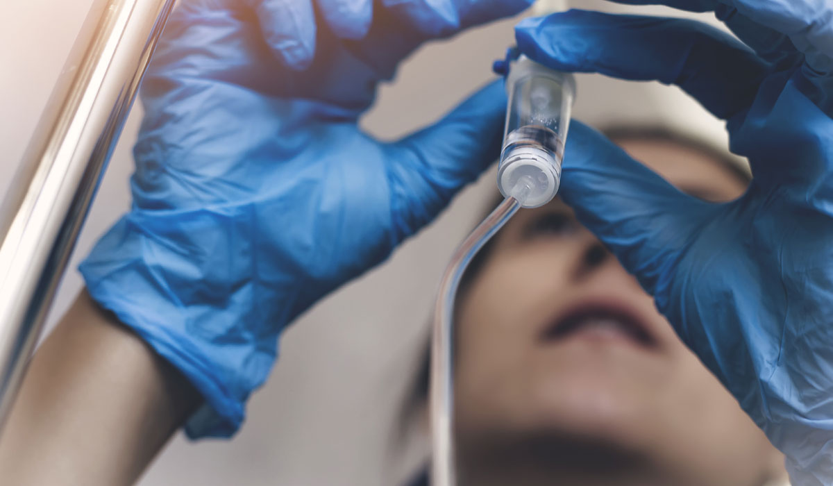 Pharmacist with an IV drip