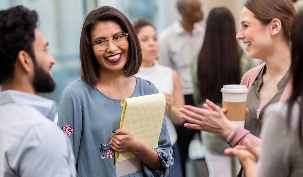 Pharmacist talking with her colleagues
